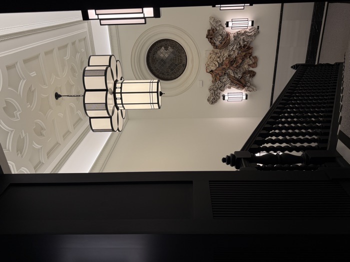 Staircase with a lantern chandelier at Hotel Palacio Don Ramón in Sevilla